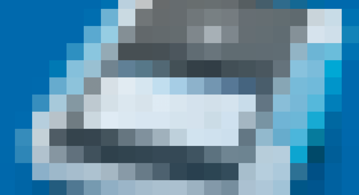 A piexlated visual of various blues, obscuring a device.